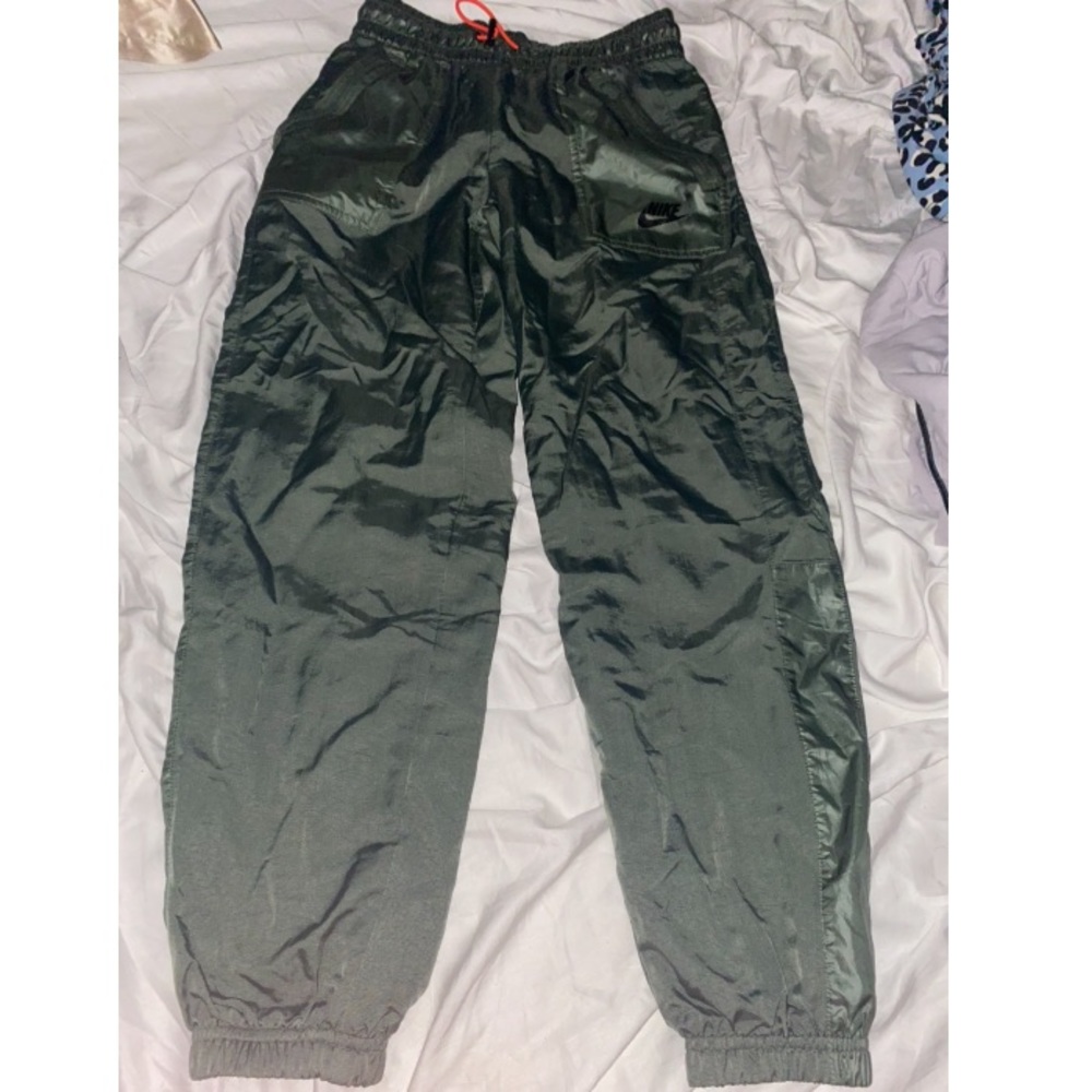 green elastic nike joggers